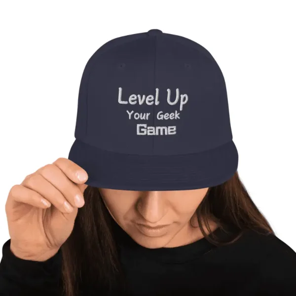 Casquette Snapback Level up your geek game bleu marine avec broderie blanche